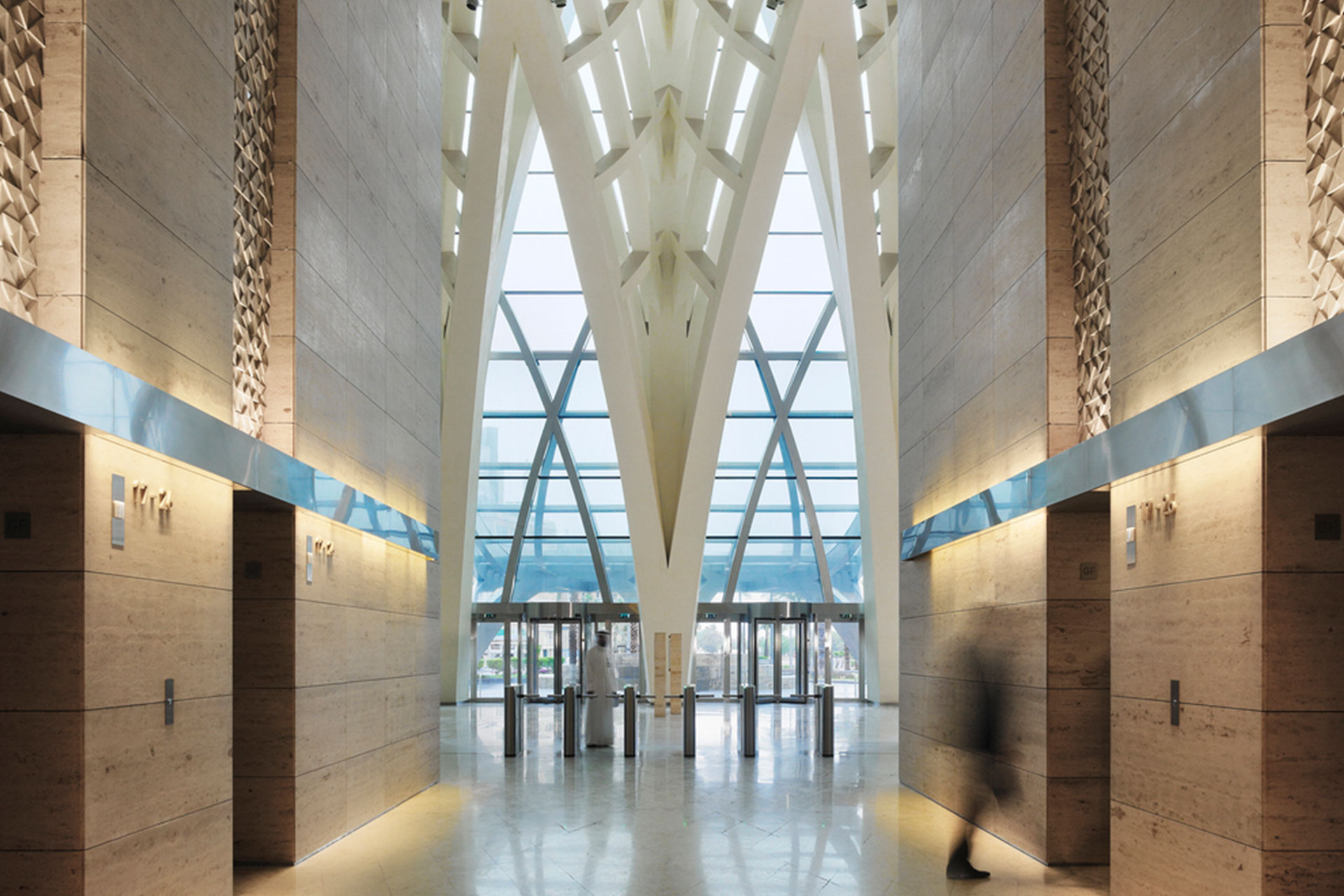 Al Hamra Firdous Tower entrance OVI architectural lighting design