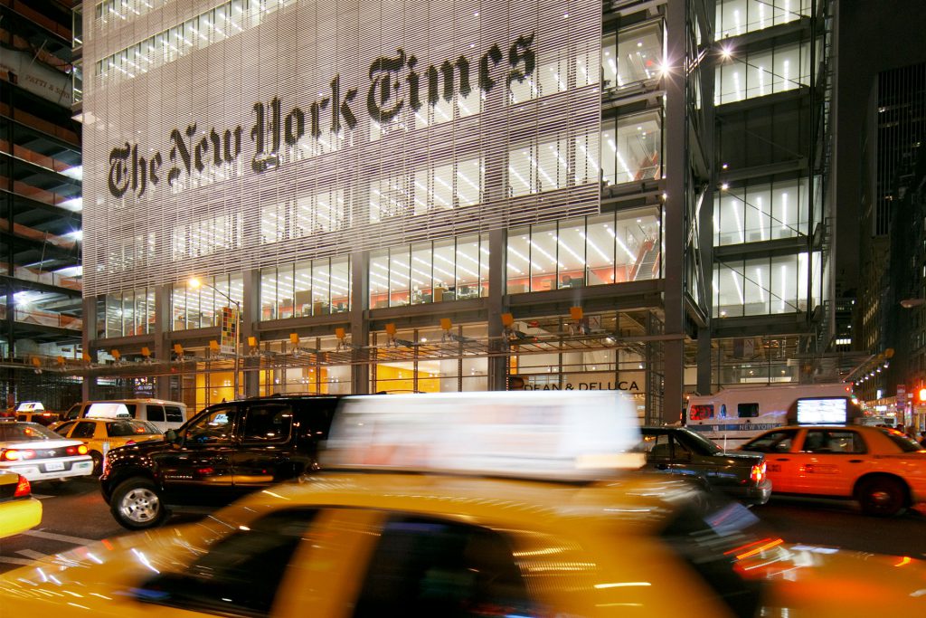 The New York Times building on a busy night featuring the lighting designs of OVI.